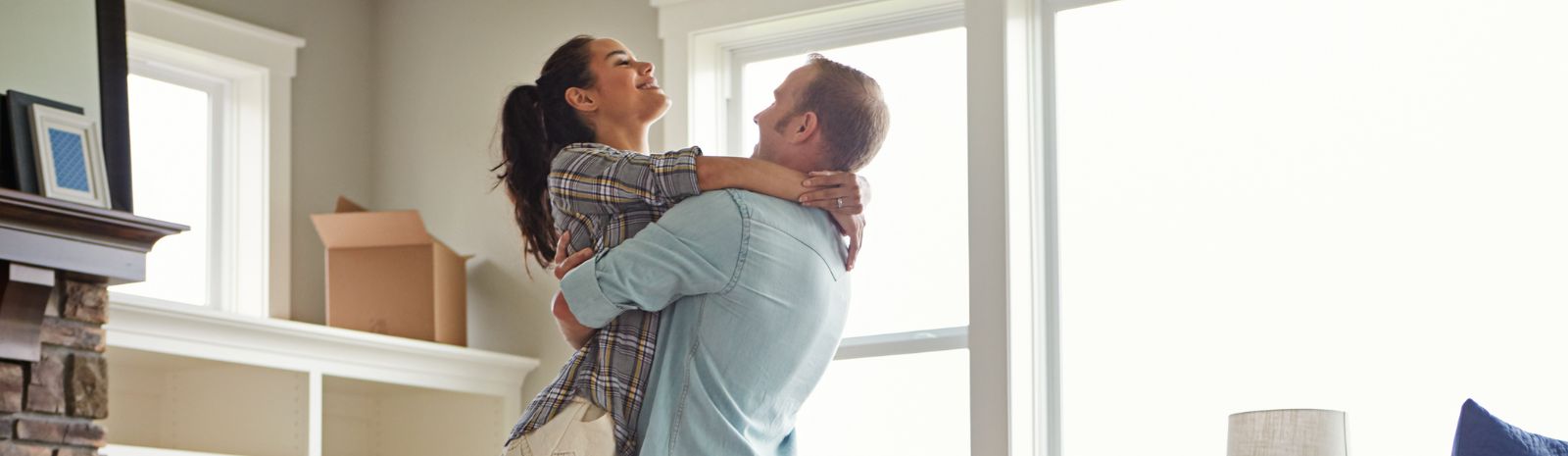 Couple embrasing in new home